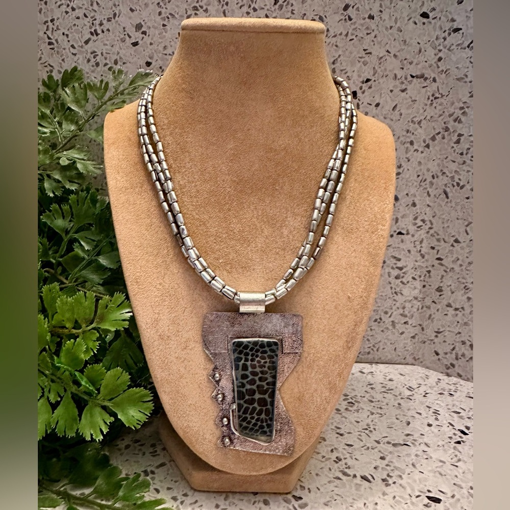Brutalist with animal print pendant necklace